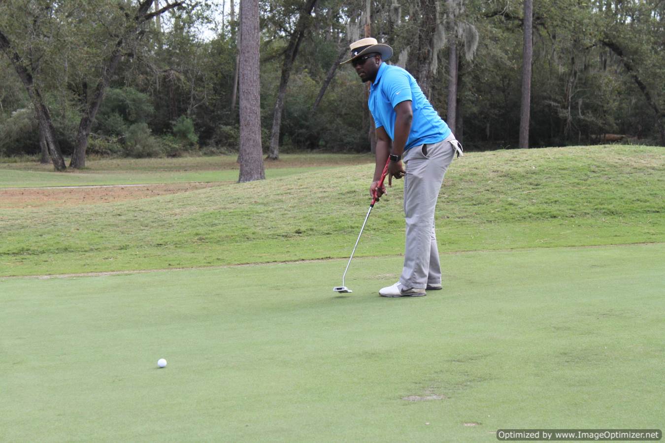 Photo of LSC employee playing golf