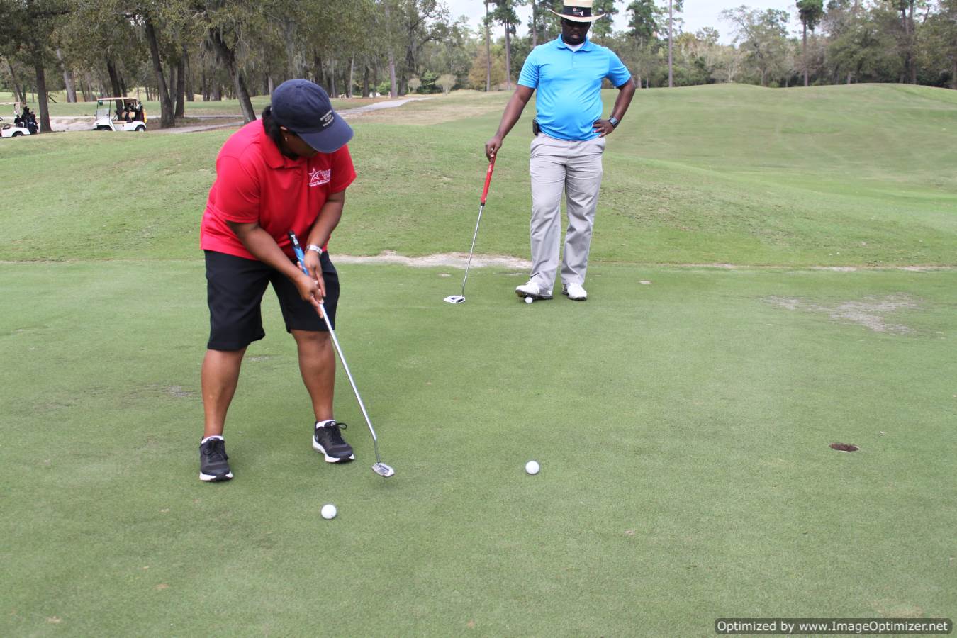 Photo of LSC employees playing golf