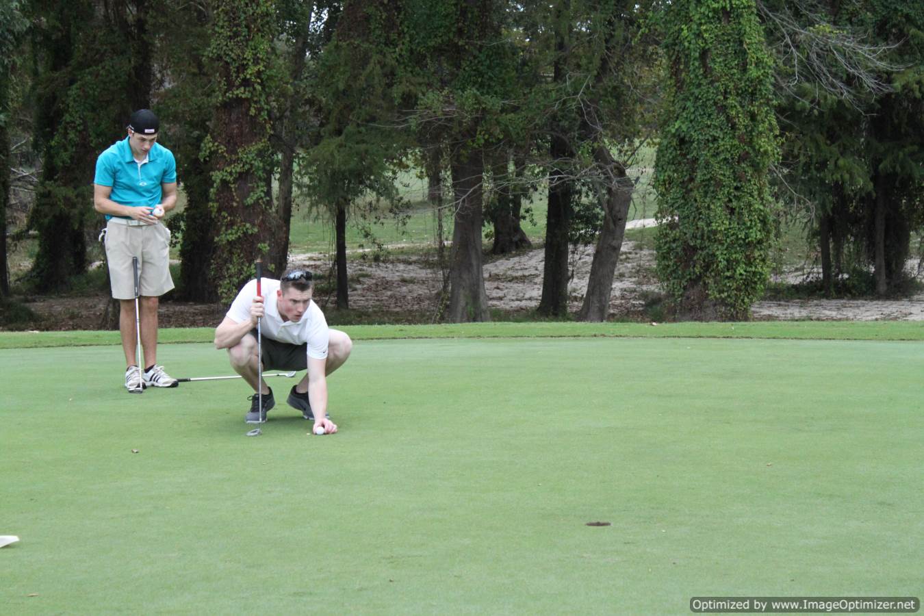 Photo of students playing golf