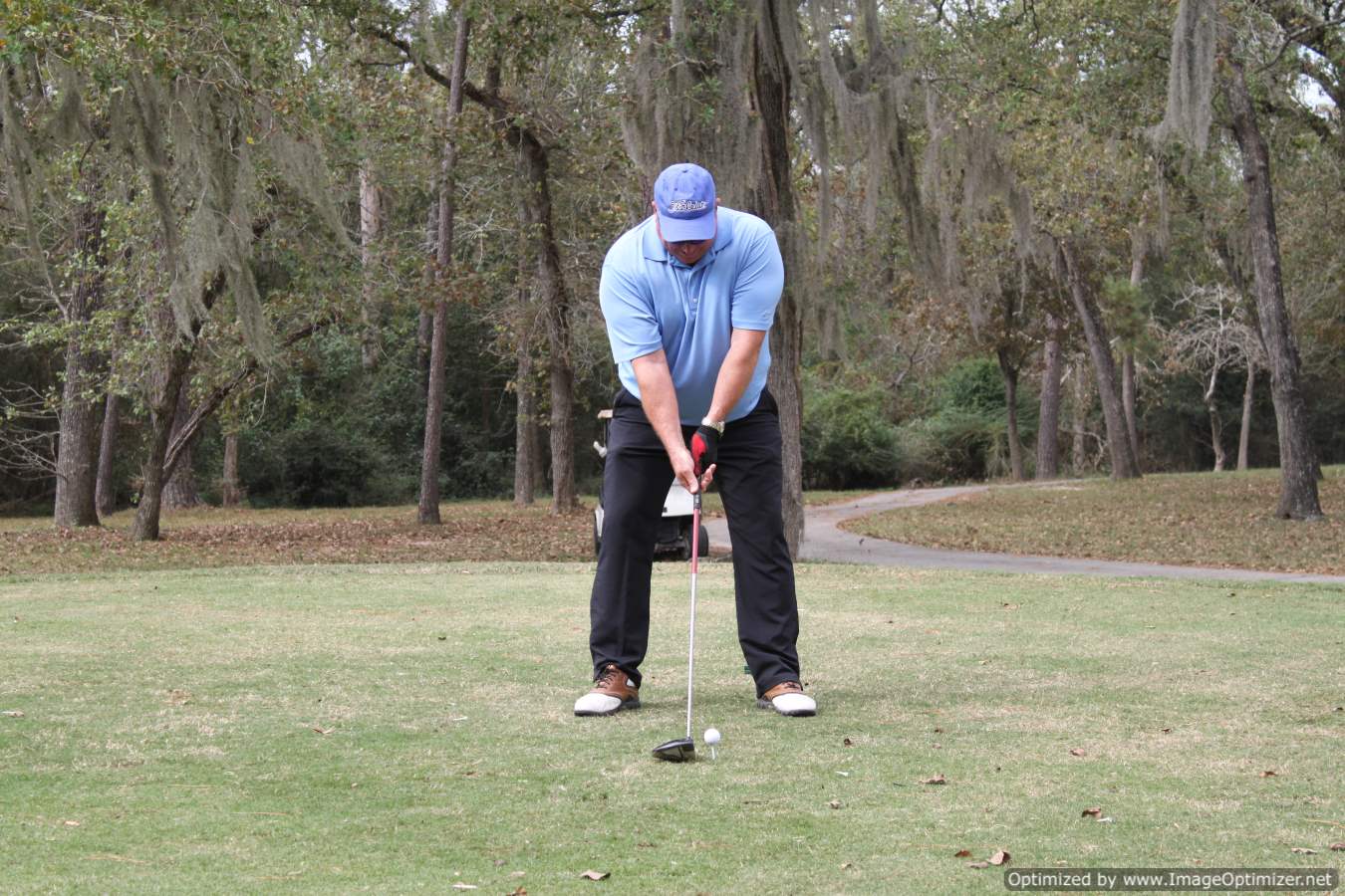 Photo of LSC Employee playing golf