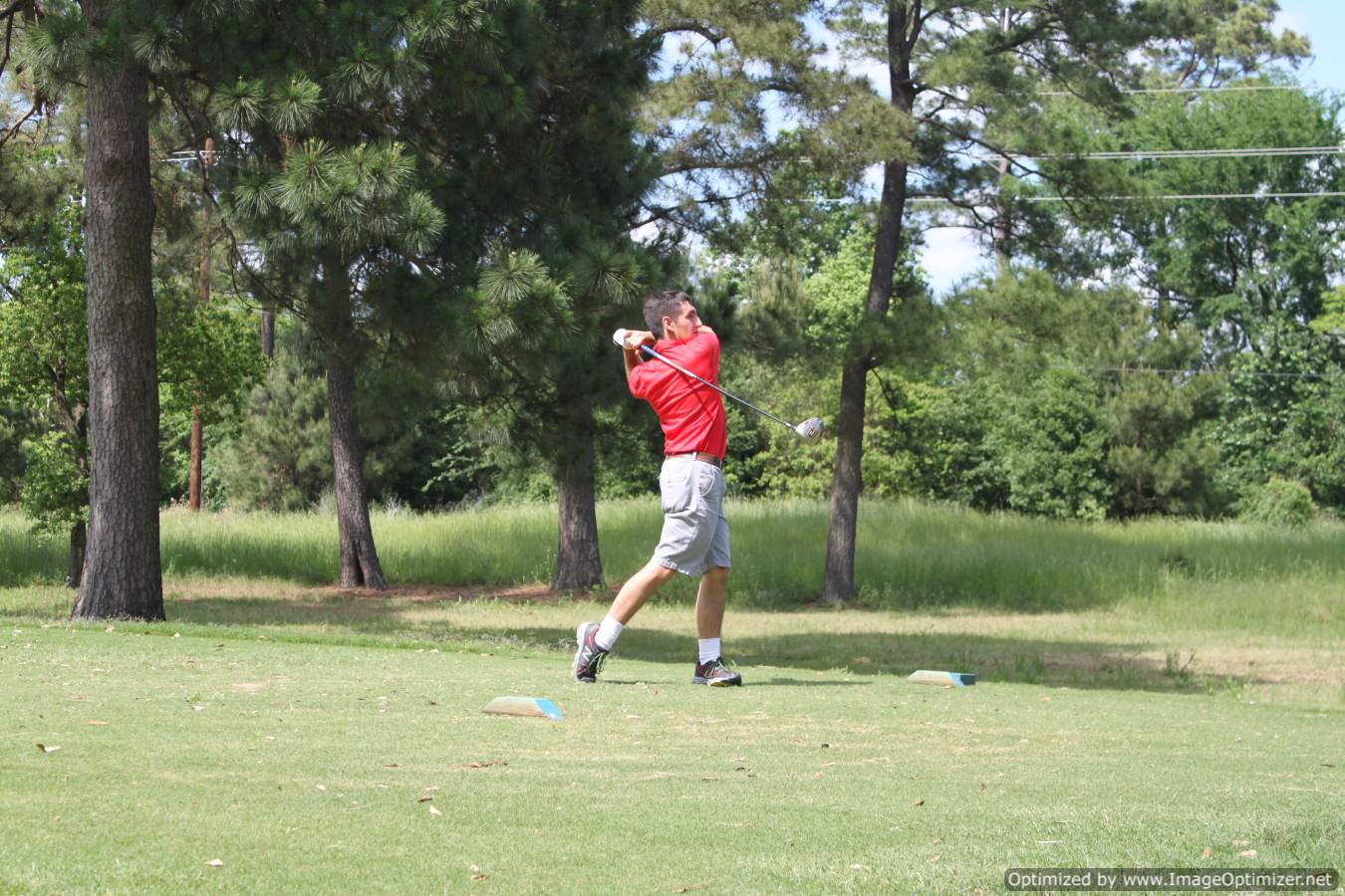 Photo of student playing golf