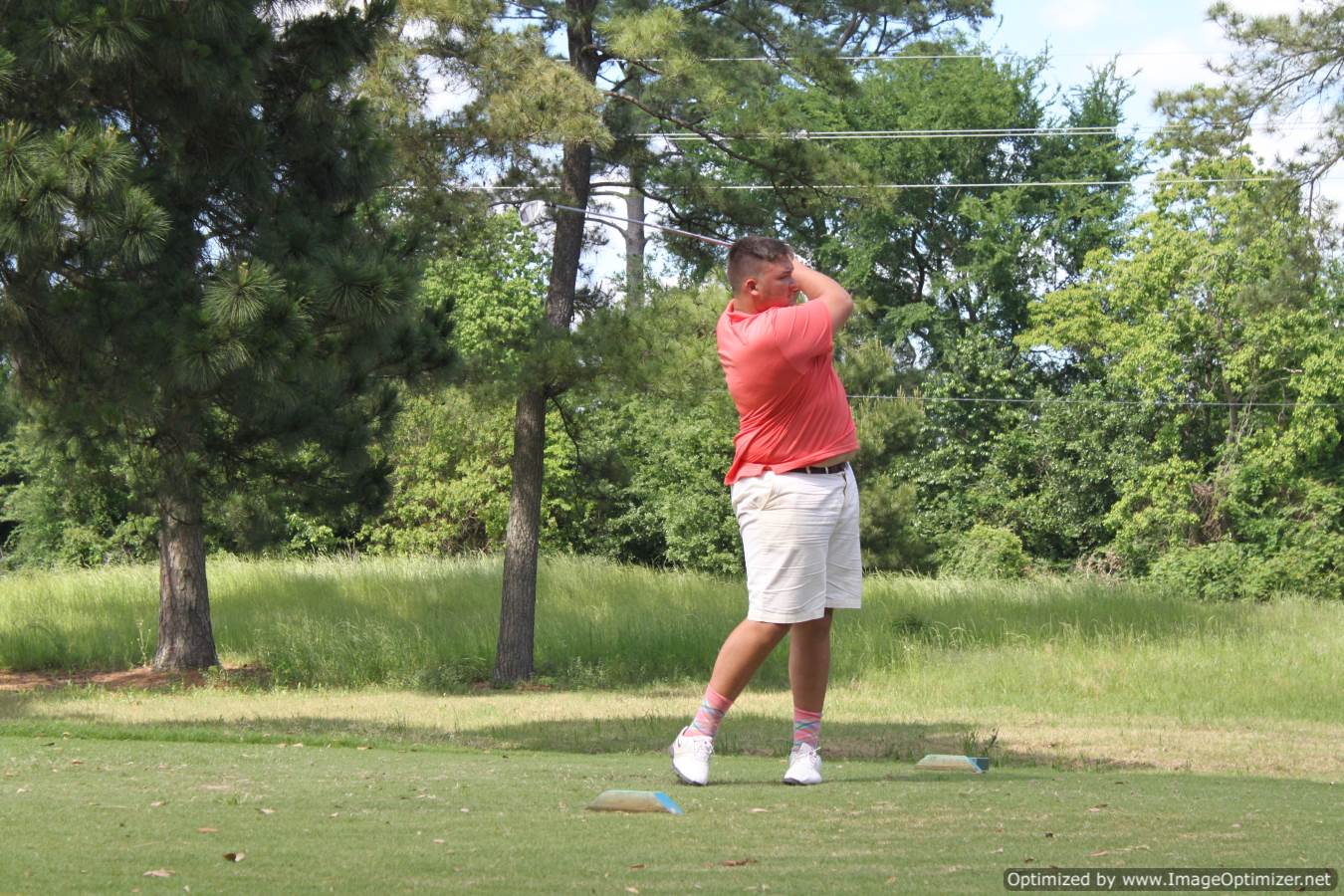 Photo of student playing golf