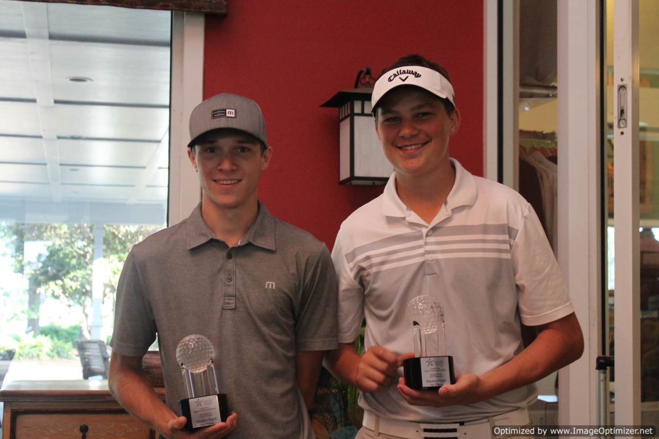 Photo of students holding a trophy