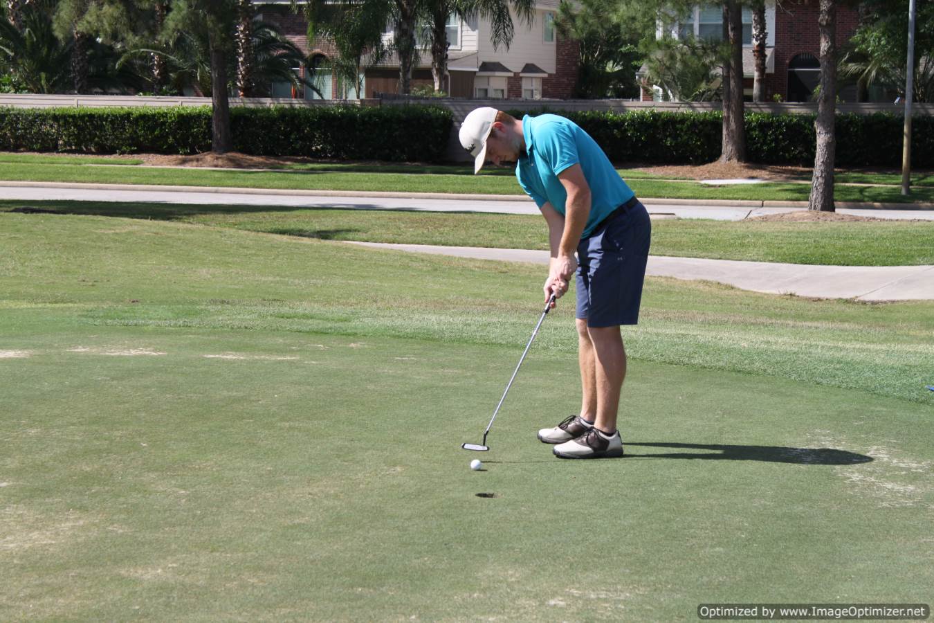 Photo of student playing golf