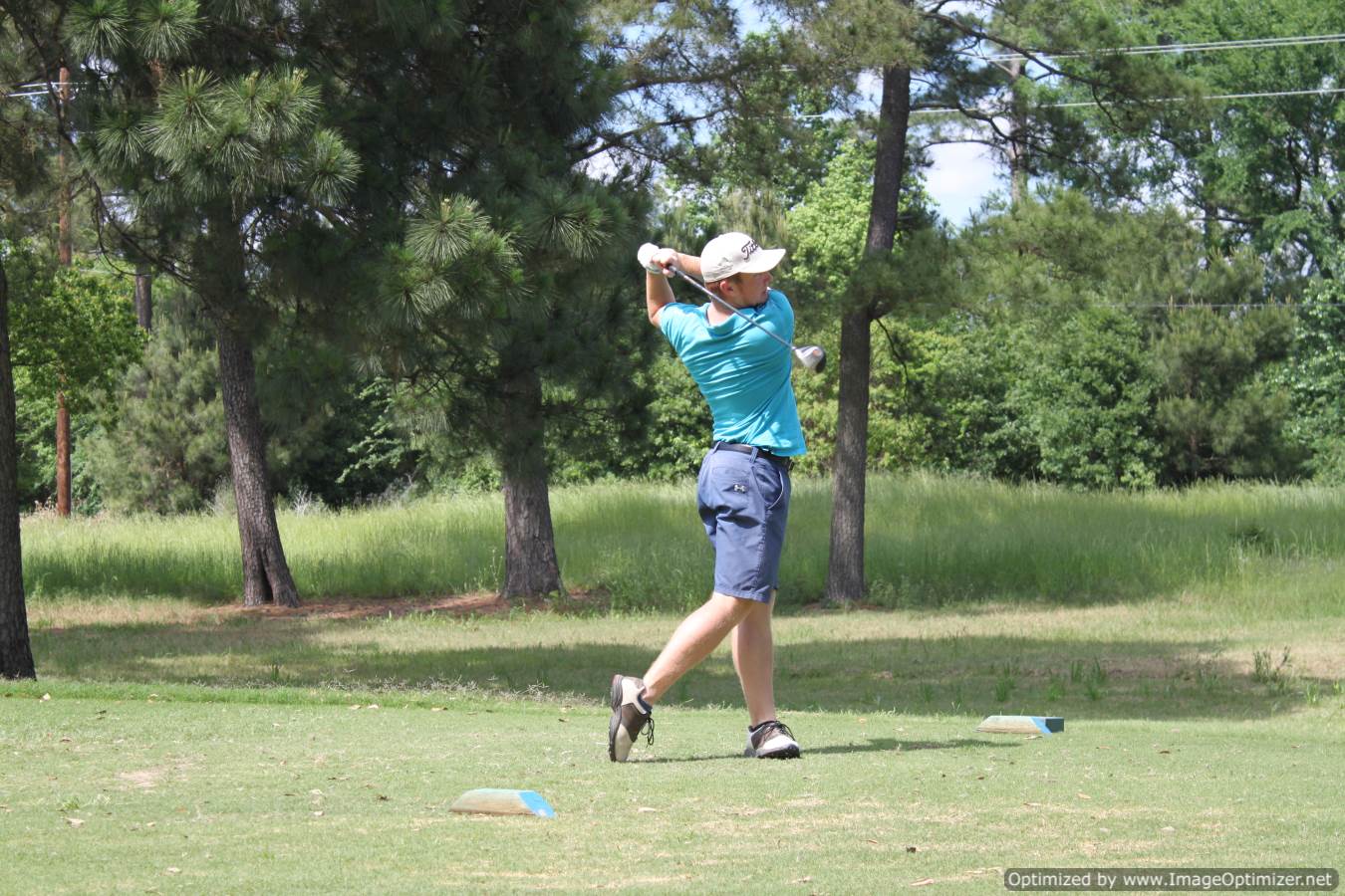 Photo of student playing golf