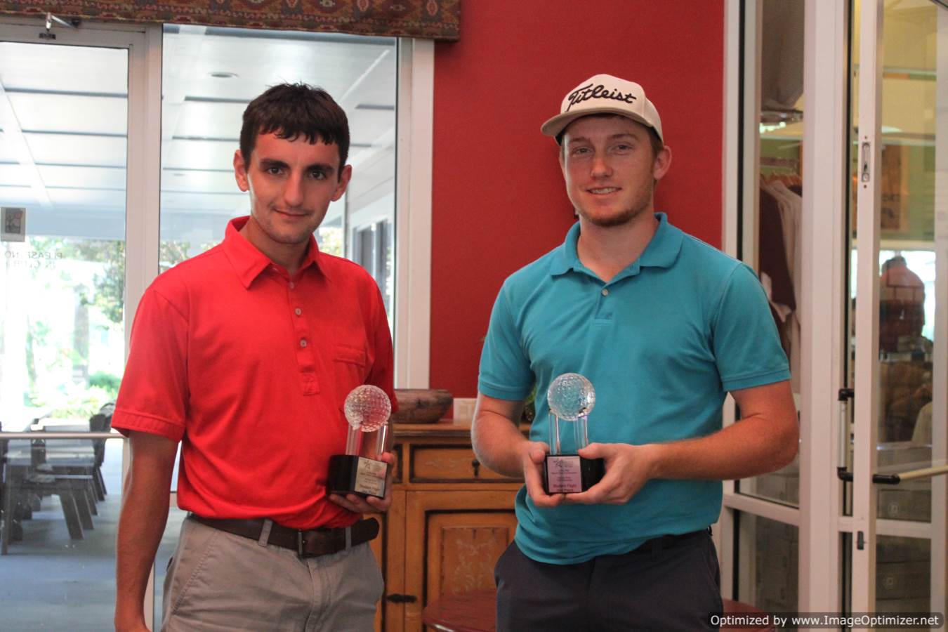 Photo of students holding a trophy