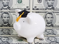 Photo of a piggy bank with graduation cap