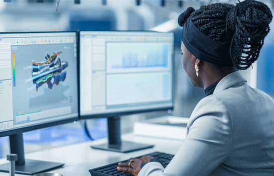 Woman looking at a mechanical design on her monitor