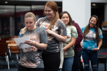 Students playing a leadership game