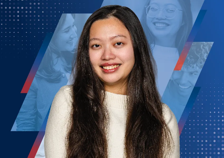 Smiling female student on a blue background
