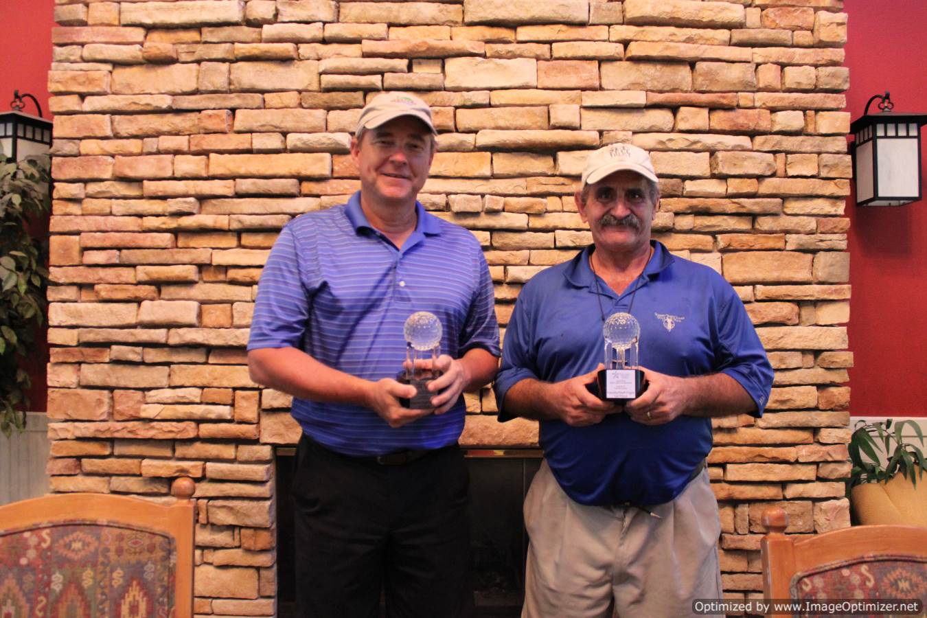 Photo of LSC employees with trophies