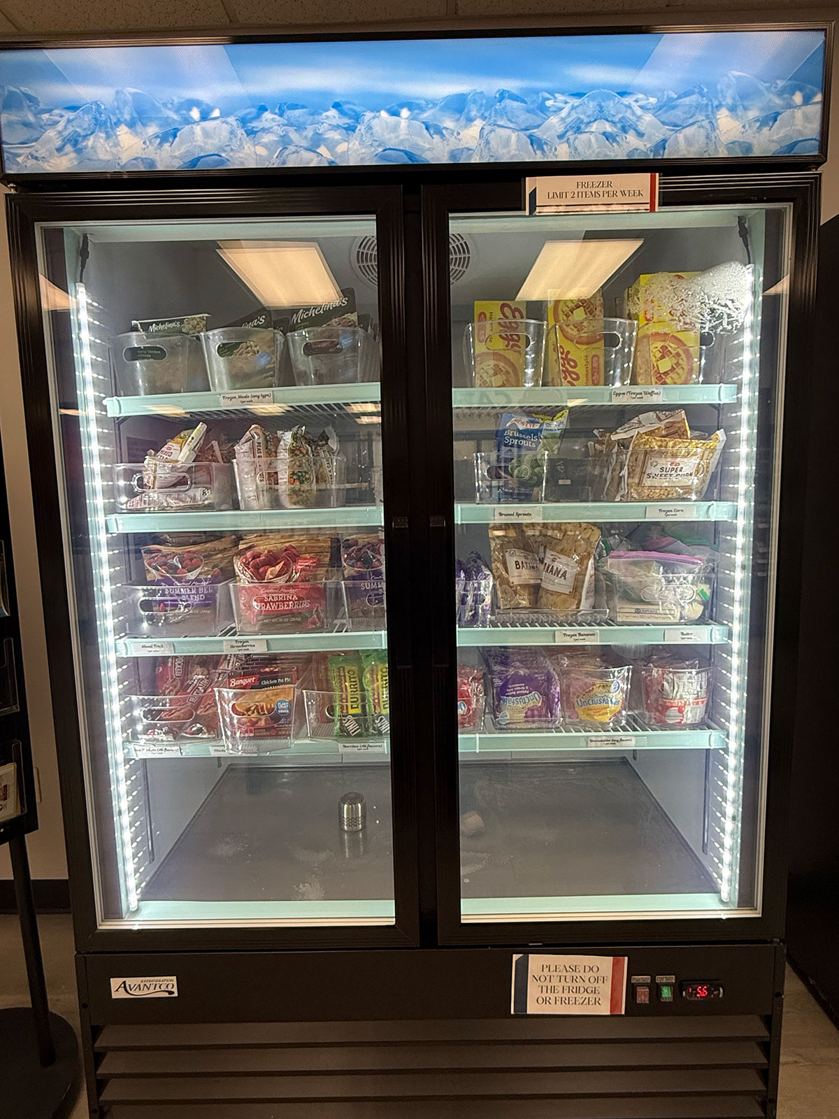 CAT-5 Cupboard Food Pantry freezer storage stocked with various frozen food items.