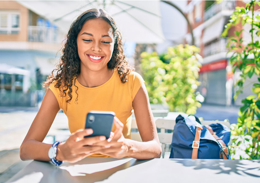 Student on cell phone registering for class