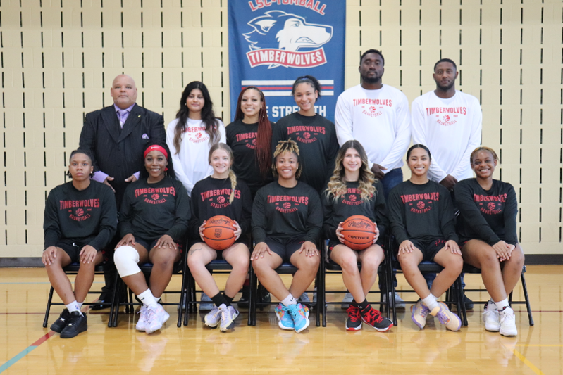 Women's basketball players smiling