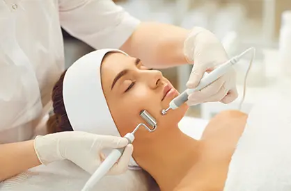 Women receiving a facial treatment