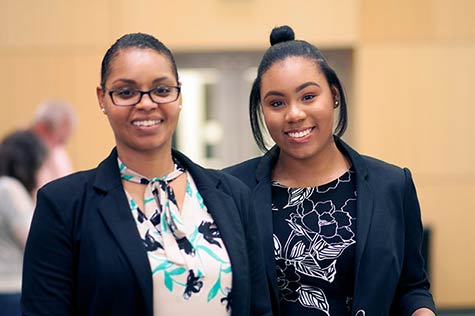 image of two ladies smiling