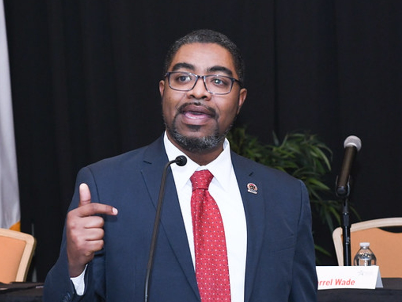 Person speaking at a podium