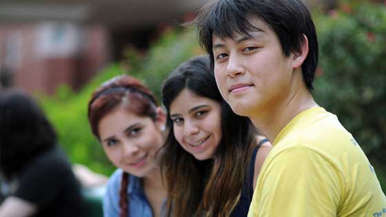 Group of three students on campus